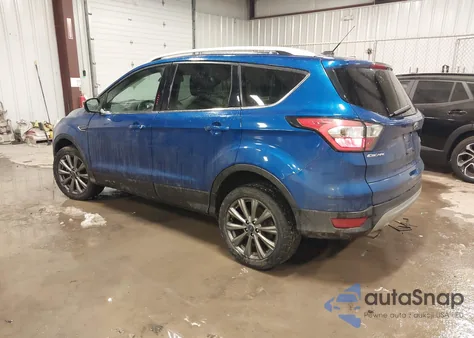 2017 Ford Escape Titanium z USA, uszkodzony, nr VIN 1FMCU9JD2HUC17878